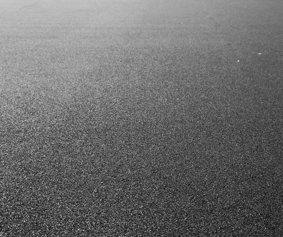 Smooth black rubber flooring surface with fine texture