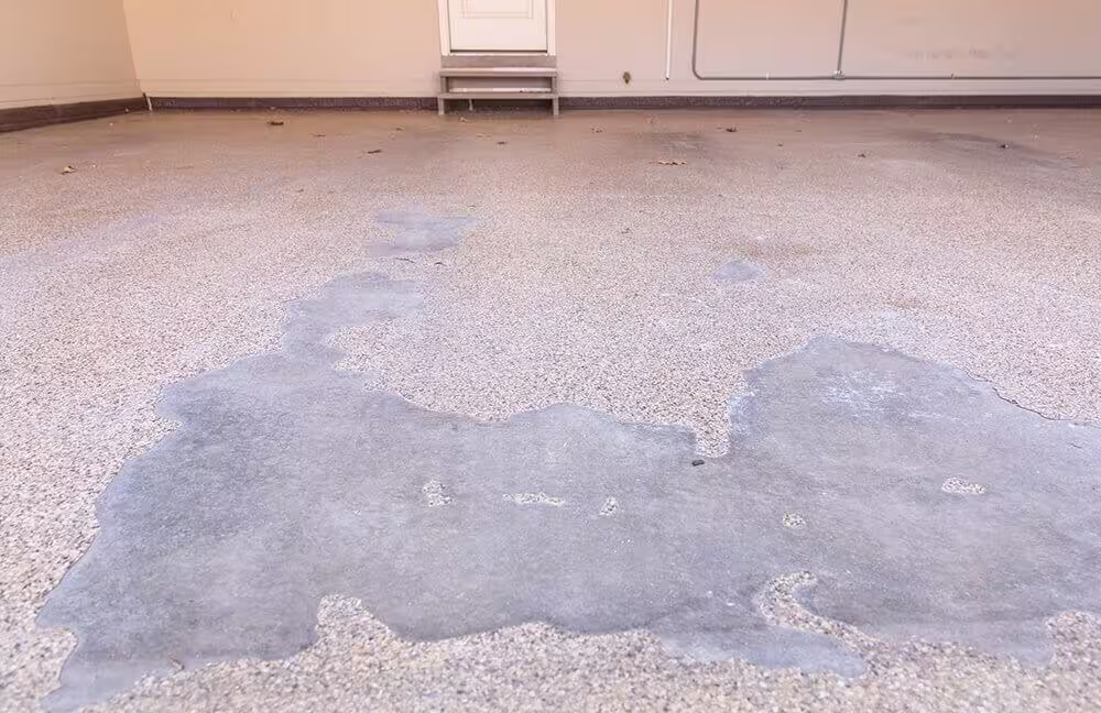 Concrete garage floor before application of a protective coating.