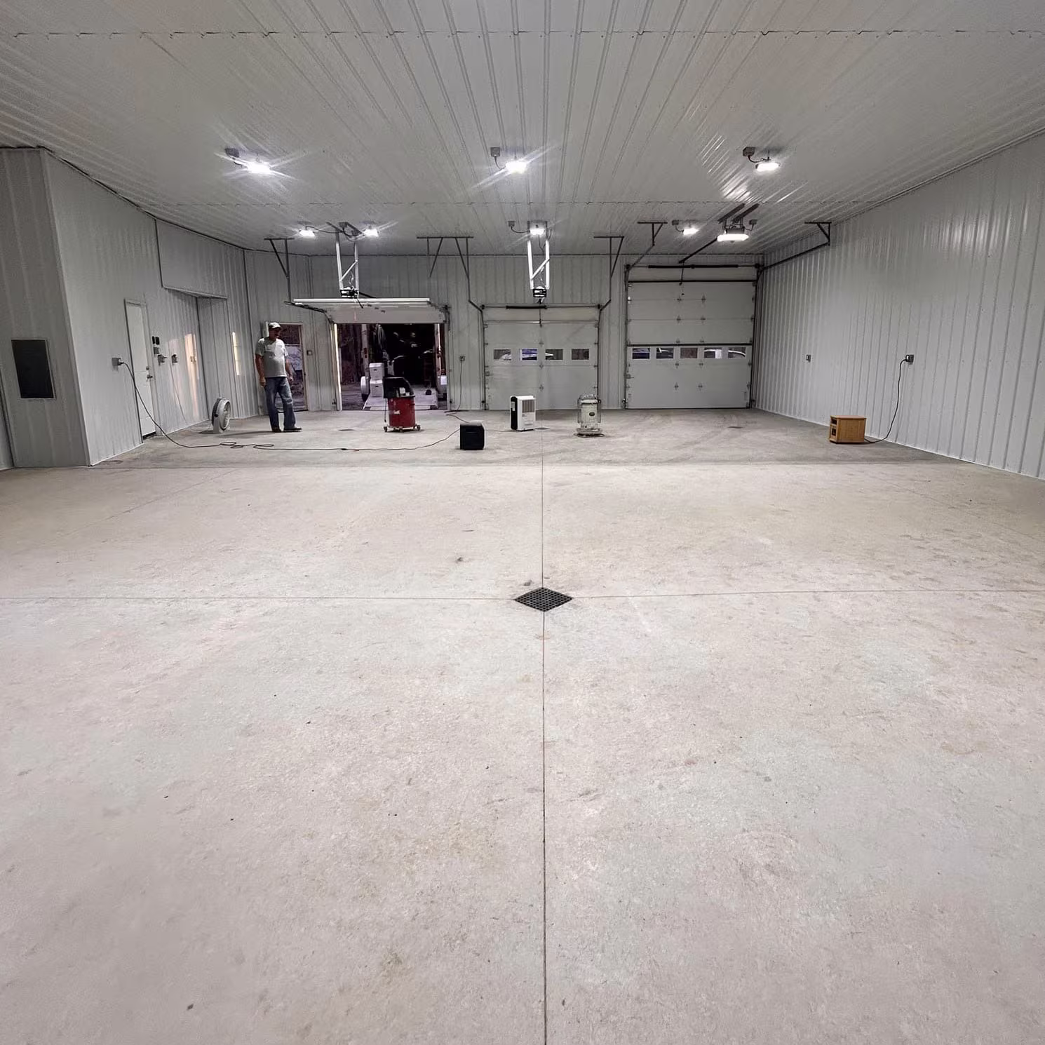 Unfinished concrete garage floor before a protective coating application.