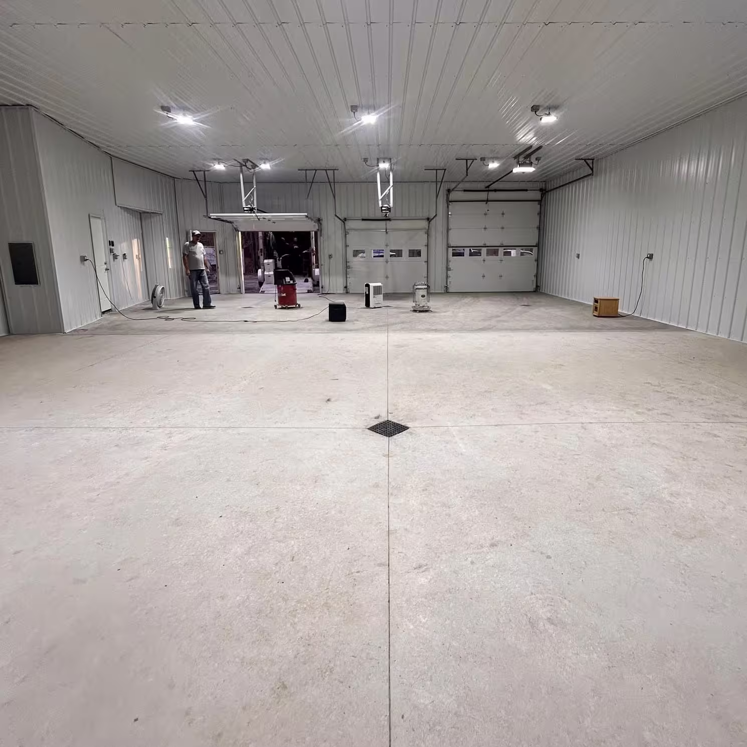 Unprepared concrete garage floor before a protective coating application.